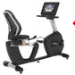 Landice R7 recumbent exercise bike with black frame, padded seat, digital display console, and red sale tag on white backgrou