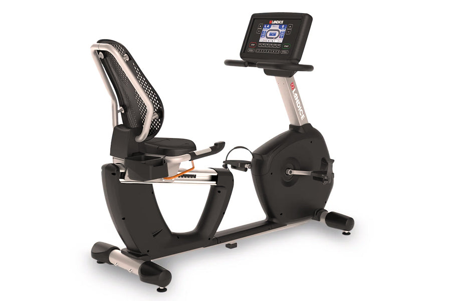 Landice R9 black recumbent exercise bike with digital display console, mesh backrest, and pedal resistance system on white ba