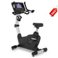 Landice U7 upright exercise bike with black and silver frame, digital console display, and black padded seat on white backgro
