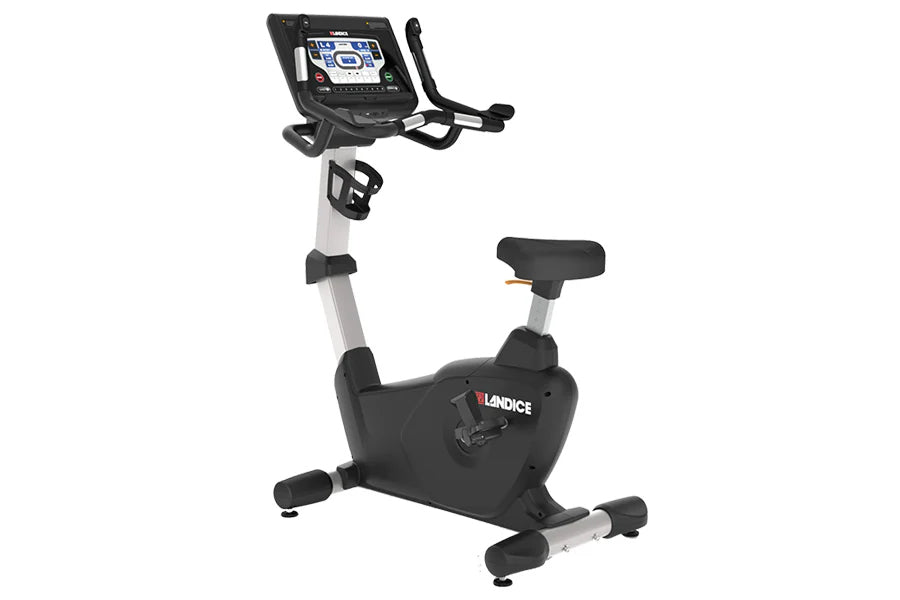 Landice U7 upright exercise bike with black frame, digital console display, and padded seat on white background