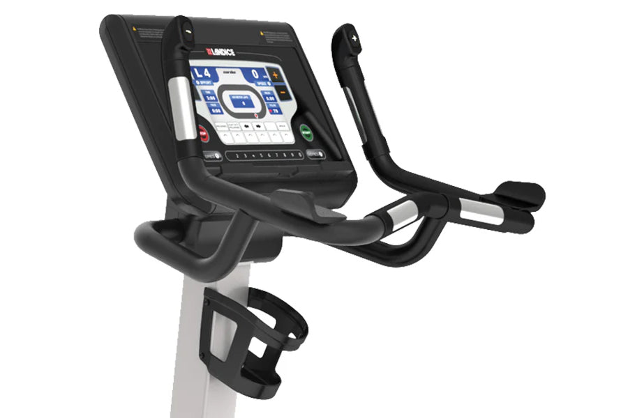 Landice U7 upright exercise bike with black frame, digital console displaying blue interface, and curved handlebars on white 