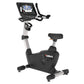Landice U9 commercial upright exercise bike with black and silver frame, digital console display, and black padded seat on wh