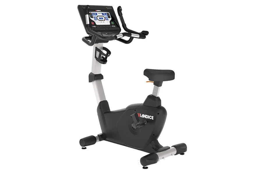 Landice U9 commercial upright exercise bike with black and silver frame, digital console display, and black padded seat on wh
