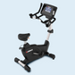 Landice U9 black upright exercise bike with digital display console, white frame, and black padded seat on light blue backgro