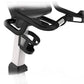 Landice U9 upright exercise bike with black curved handlebars, white frame, and digital console display on white background
