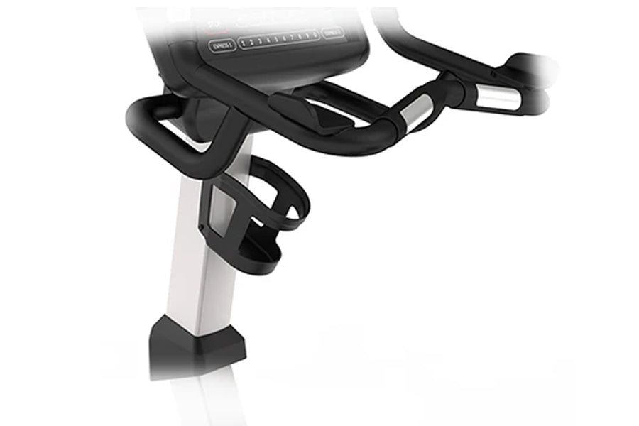Landice U9 upright exercise bike with black curved handlebars, white frame, and digital console display on white background
