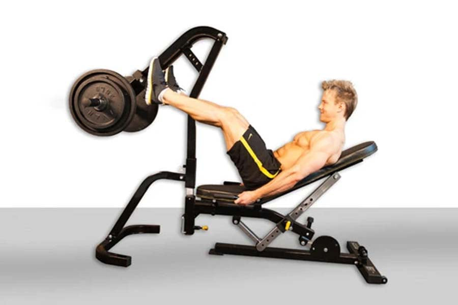 Black and gray leg press attachment with weight plate, demonstrated by shirtless male model on adjustable bench with footplat