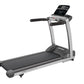 Life Fitness T3 treadmill with black running deck, silver frame, black handles, and digital display console on white backgrou