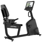 Life Fitness Atmos recumbent exercise bike in black with padded seat back, handlebars, and digital display screen showing wor