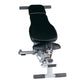 Black padded upright exercise bench with adjustable backrest, gray metal frame, and leg extension attachment on white backgro
