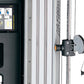 Life Fitness G7 home gym with black and silver frame, showing control panel and pulley system with white handles, on white ba