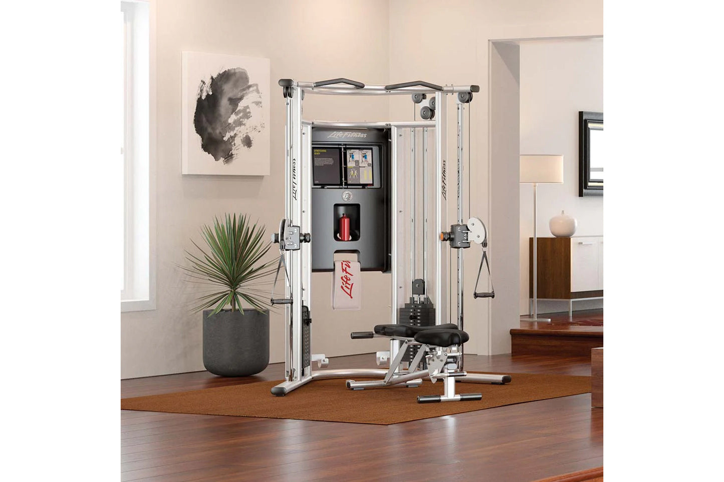 Life Fitness G7 cable machine home gym with silver frame, black seat, dual weight stacks, and attachments in modern living ro