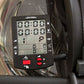 Black digital monitor display mounted on water rower showing dual time readouts, distance, heart rate, and control buttons wi