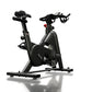 Life Fitness IC3 black stationary indoor cycle with adjustable seat, handlebars and flywheel on white background