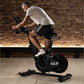 Man exercising on a stationary bike