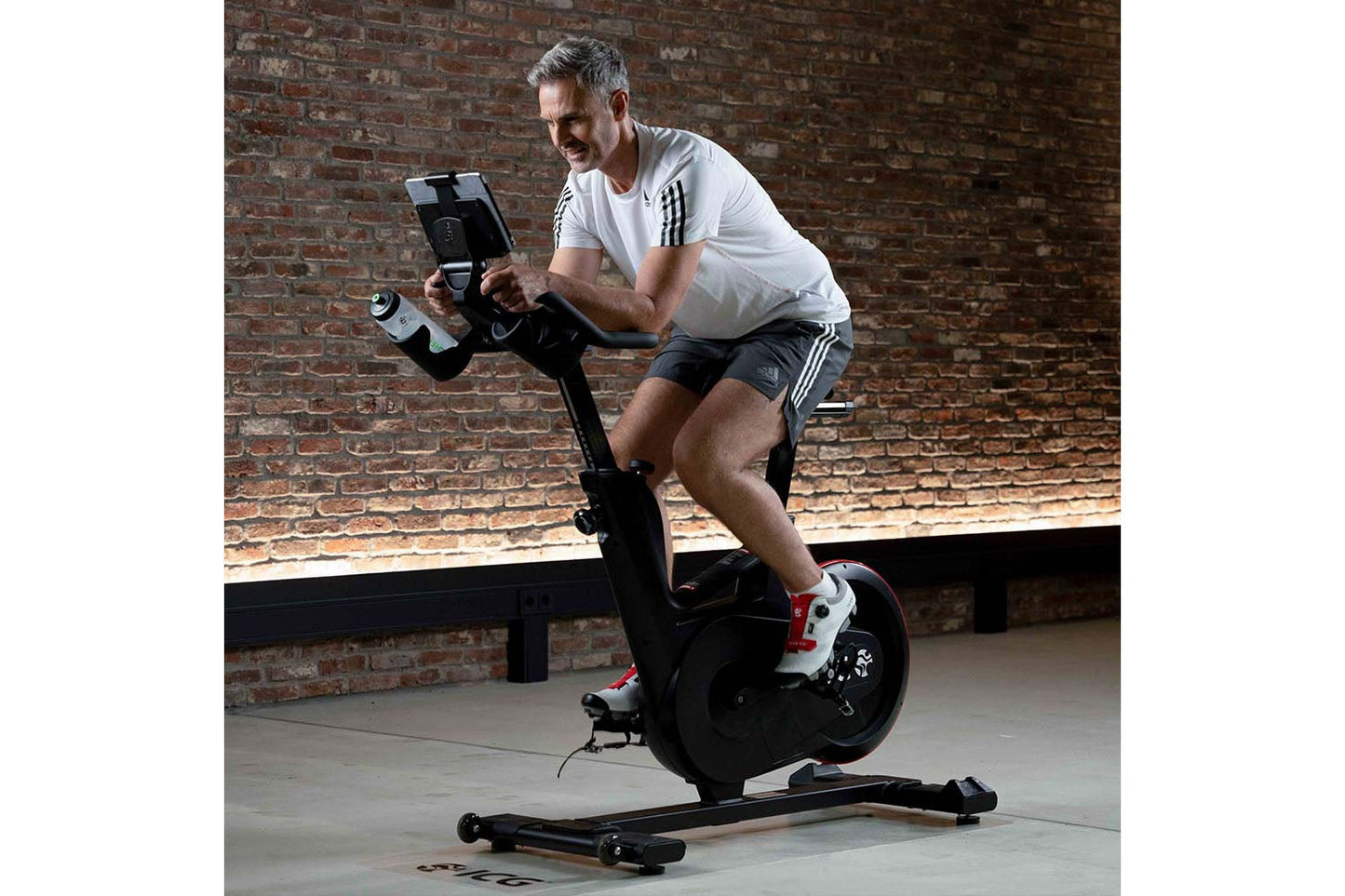 Man exercising on a stationary bike