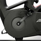 Black exercise bike with a visible brand logo