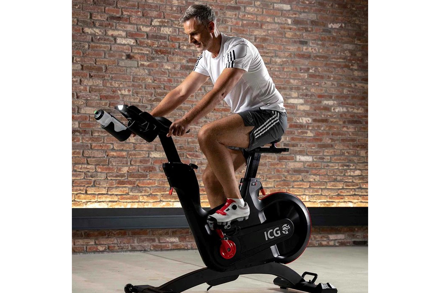 Man exercising on a stationary bike