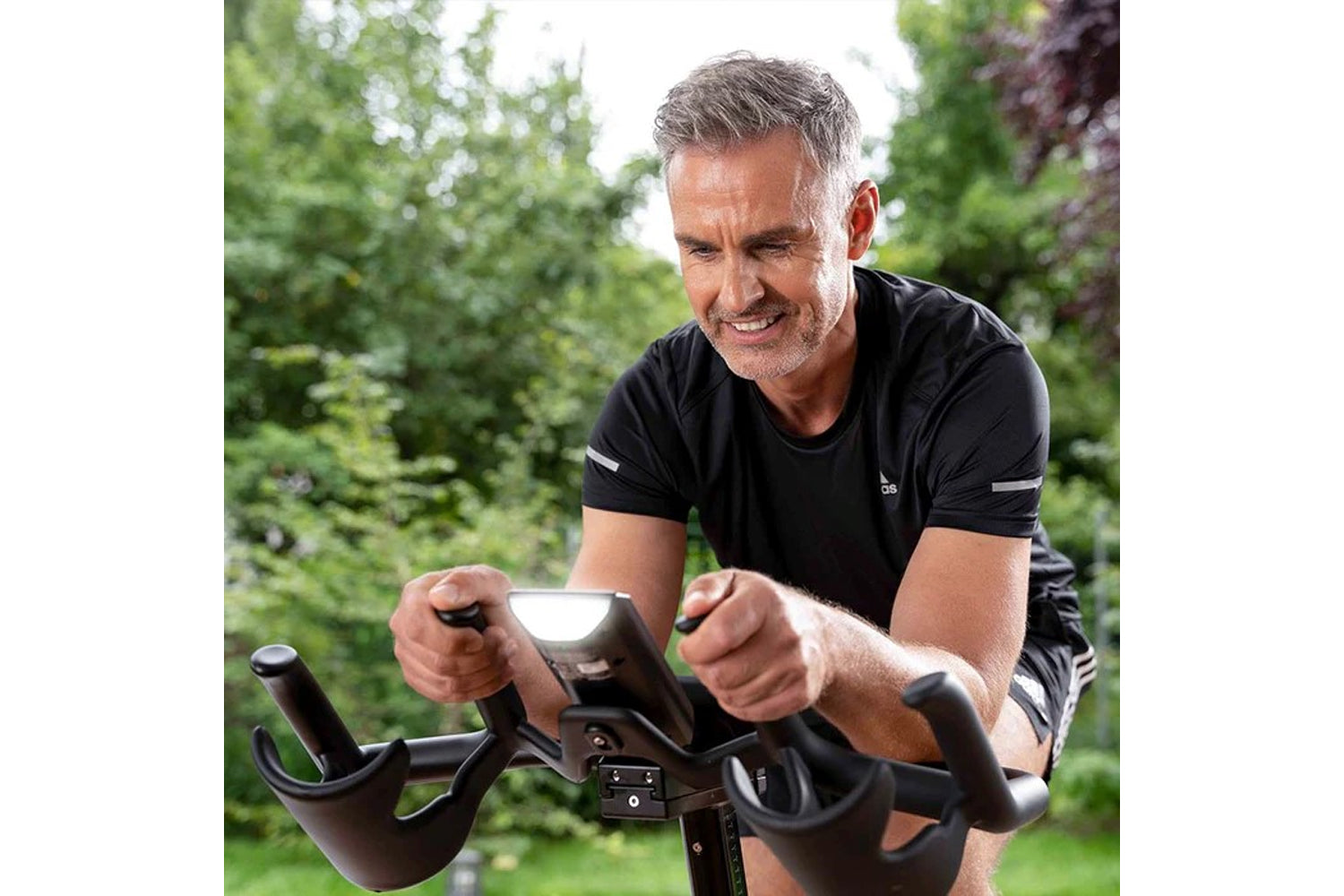 Man exercising on a stationary bike