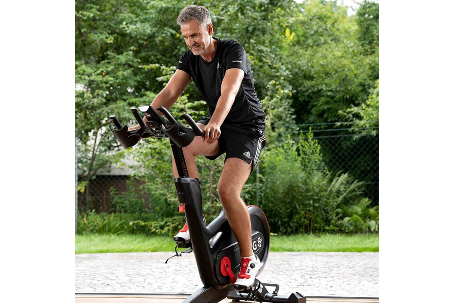 Man exercising on a stationary bike
