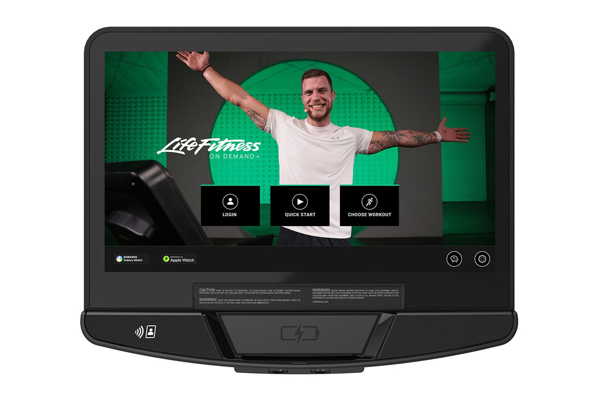 Life Fitness On Demand+ treadmill display screen showing fitness instructor in white shirt with green background and workout 
