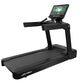 Black Life Fitness Integrity+ treadmill with digital touchscreen display showing workout interface, isolated on white backgro