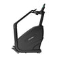 Black Life Fitness PowerMill climbing machine with dual handles and digital display on white background