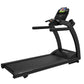 Black Life Fitness treadmill with curved frame, padded running deck, and digital display console mounted on handles showing f