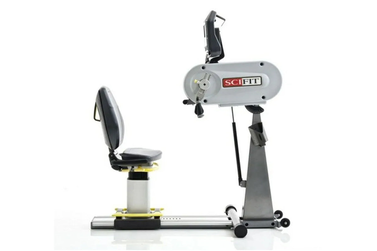 Gray and black SCIFIT PRO1 upper body ergometer with adjustable seat and pedal resistance system on white background