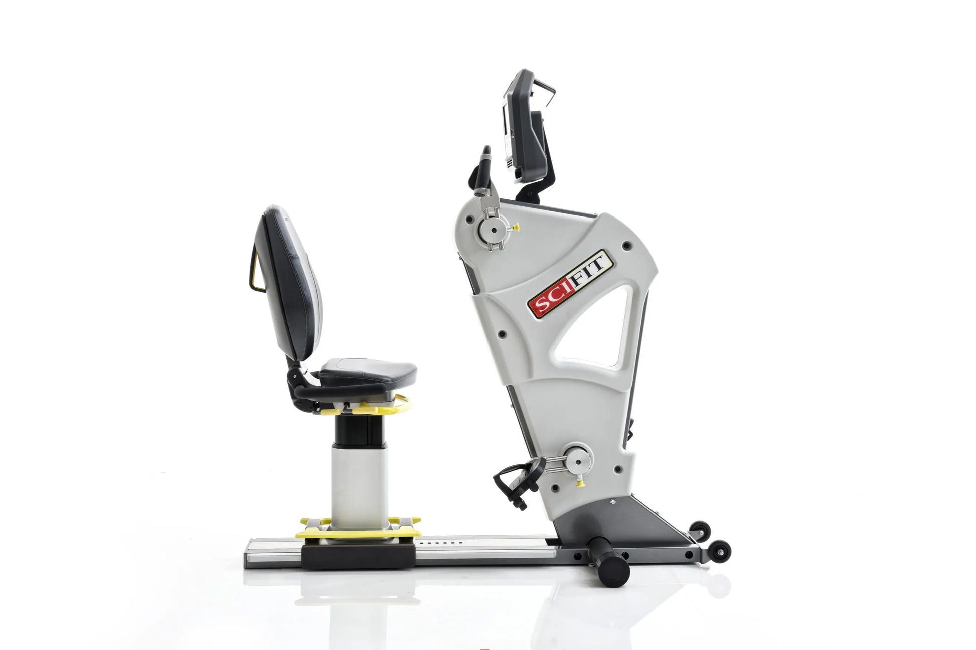 Scifit Pro2 Total Body Exercise Trainer with gray frame, black padded seat and backrest, dual handles, and foot pedals on whi