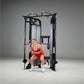 Woman in red sports bra and shorts using black dual adjustable pulley cable machine on gray background