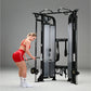 Black and silver dual adjustable pulley machine with cable attachments, worn by model in red sports bra and shorts on gray ba