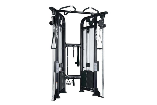 Life Fitness Signature Series black and silver dual adjustable pulley machine with cable systems and handles on white backgro