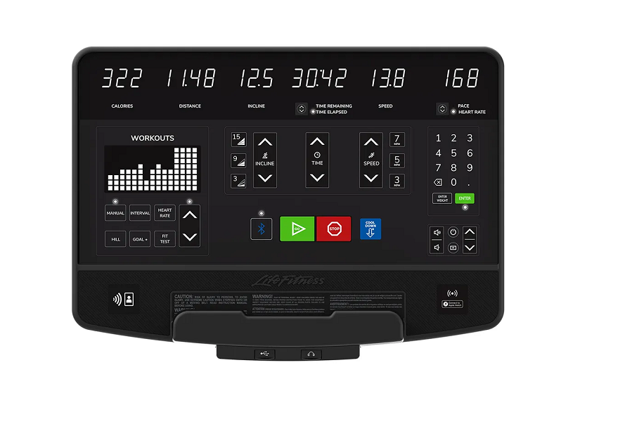 Life Fitness Club Series Plus treadmill with black console displaying workout metrics, digital numbers, control buttons, and 