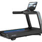 Black and gray Life Fitness treadmill with digital touchscreen display and blue accent lighting on running belt, viewed from 