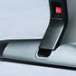 Black and silver stationary bike armrest with red power button featuring on-off symbols