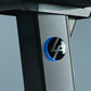Silver and black stationary bike frame with blue illuminated logo detail on side panel