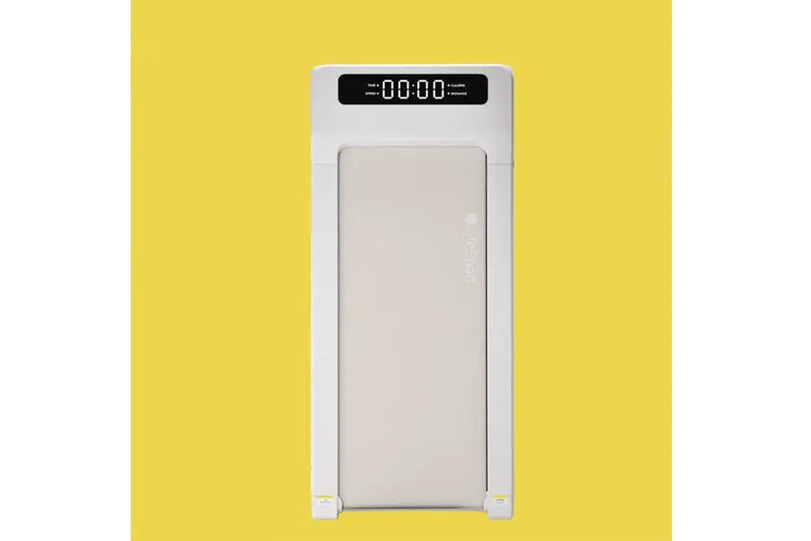 White LifeSpan under-desk treadmill with digital display showing time, on yellow background