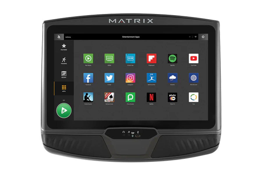 Matrix C50 Climbmill with digital display showing entertainment apps menu on black background