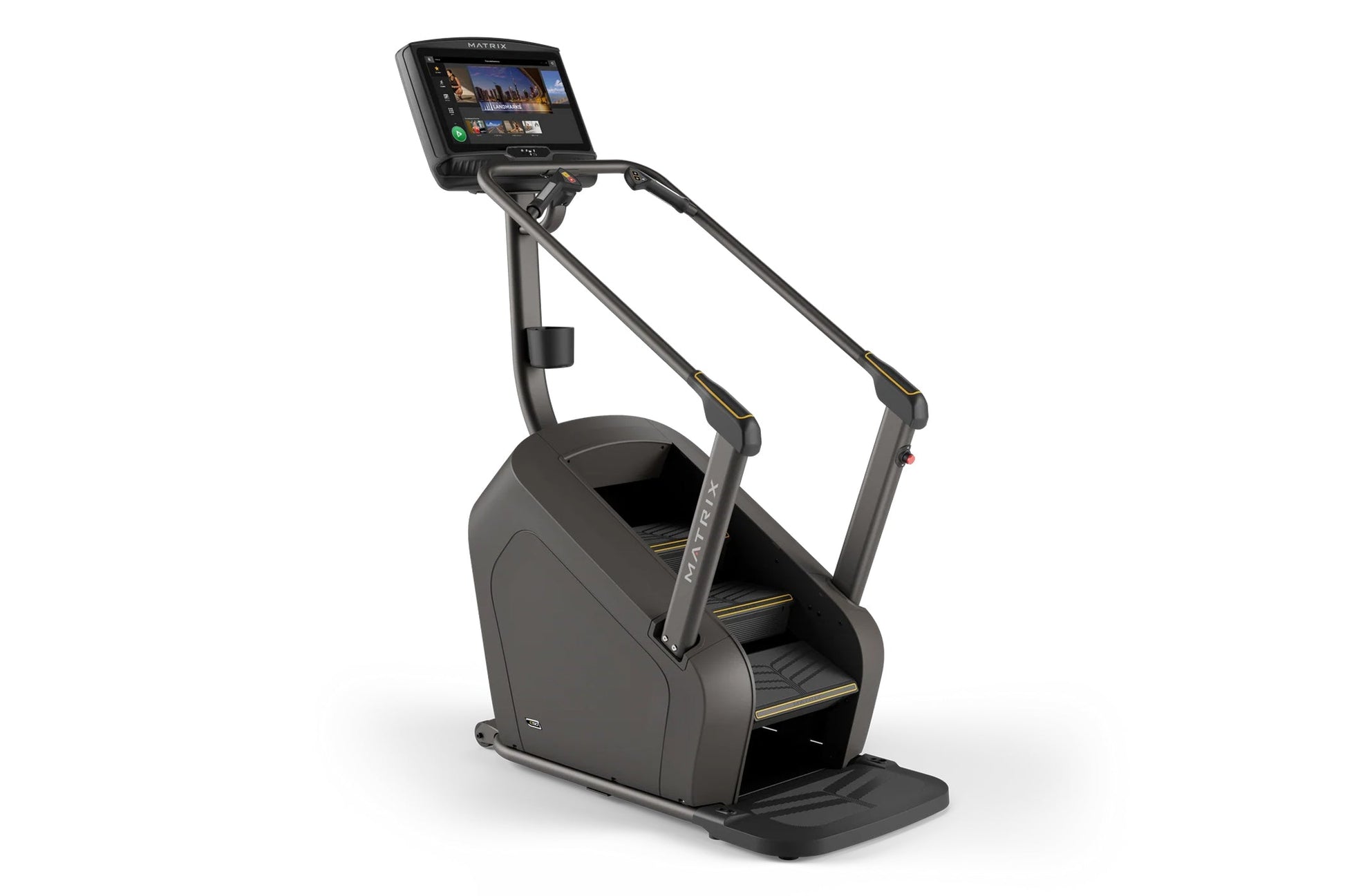 Matrix C50 Climbmill with black frame, digital touchscreen display showing workout metrics, and gold accents on footplates, o