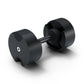 Black adjustable dumbbell with textured weight plates and metal handle, shown on white background