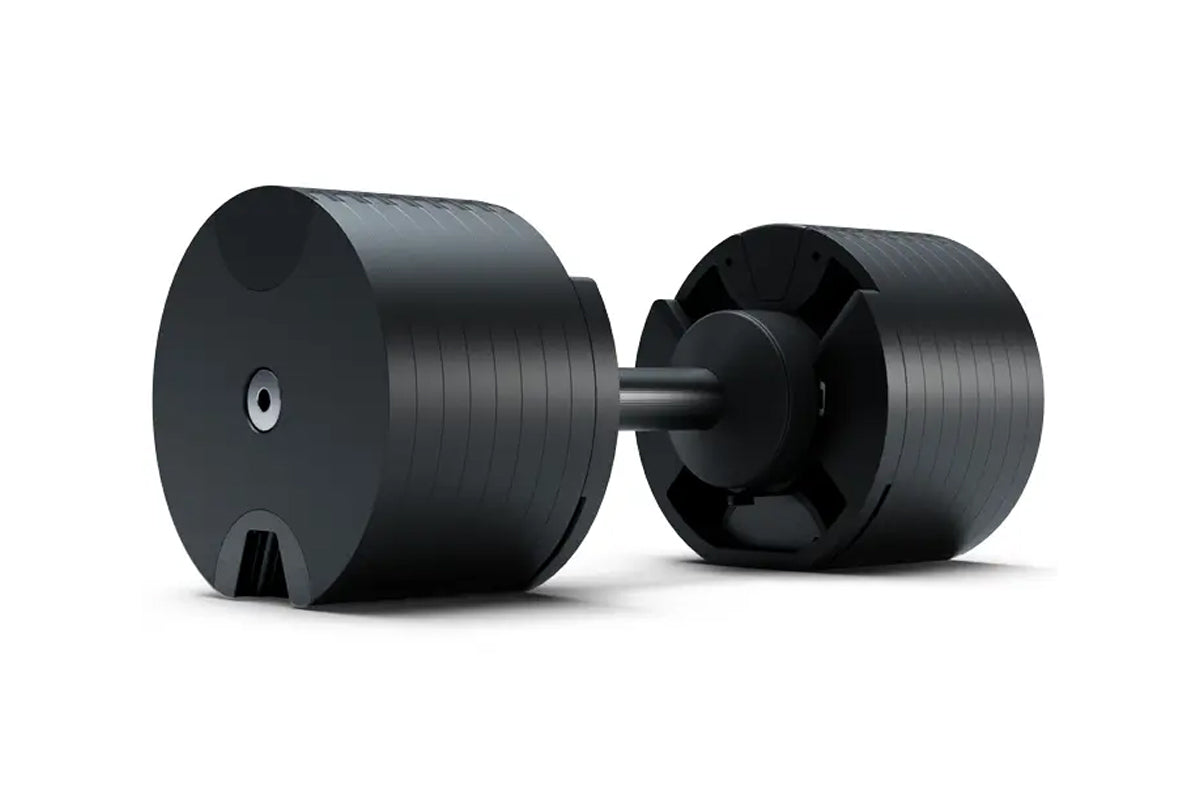 Pair of black Matrix DB80 adjustable dumbbells with grooved weight plates and connecting chrome bar on white background