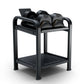 Black metal dumbbell rack with two shelves holding black adjustable dumbbells with gray accents, on white background
