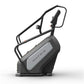 Matrix Endurance ClimbMill stair climbing exercise machine with black frame and gray console on white background