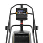 Matrix Endurance ClimbMill stair climber with black frame, digital display console, and gray footplates on white background