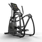 Black Matrix elliptical machine with digital display console, dual handles, and foot pedals on white background