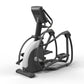 Matrix Endurance elliptical machine with black frame, white accents, digital console, and dual foot pedals on white backgroun