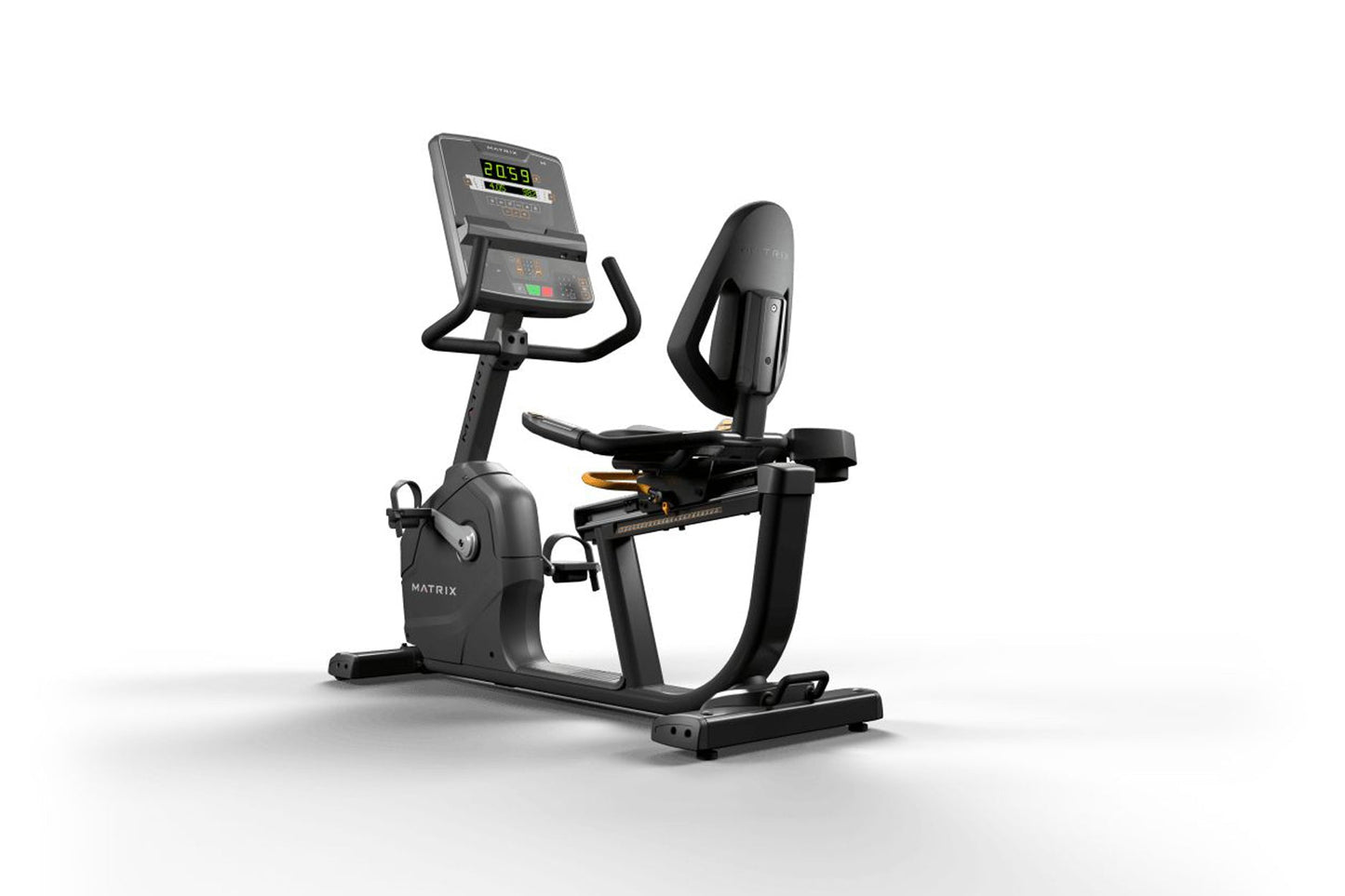 Matrix Endurance recumbent exercise bike with digital display console, black frame, and padded seat on white background