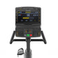 Matrix Endurance recumbent exercise bike with digital display showing sprint workout metrics, black frame with gold accents, 