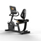 Matrix black recumbent exercise bike with digital touchscreen display, padded seat, and handlebar grips on white background